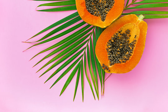 Half Cut Papaya On Color Background