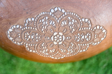 clay vase, close up of decorative clay pottery with mandala pattern, handmade ceramic vase with...