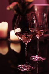 two glasses of wine on a table