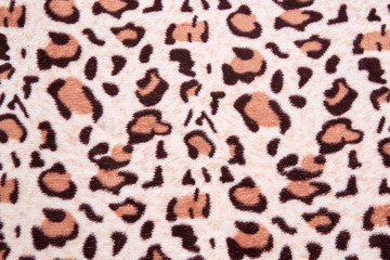 Leopard leather pattern texture closeup background realistic color textile