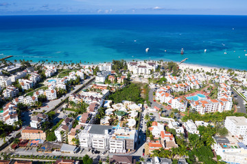Aerial view with caribbean city on the beach - obrazy, fototapety, plakaty