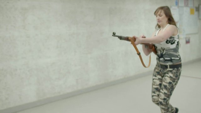 Slow Motion - Young Girl Running Aiming K-98