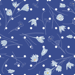 Seamless vector floral pattern with hand drawn abstract spring flowers in monochrome blue colors on polka dot background. Endless print