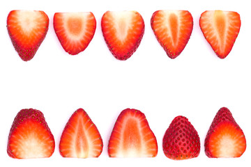 Plate of sliced strawberries isolated on white background. Strawberry berry on a white background. Neatly arranged slices of red strawberries on a white background with space for text.