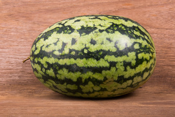 watermelon on brown wooden background