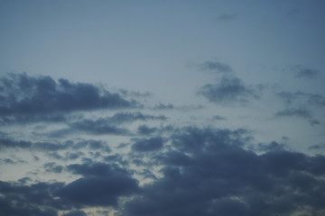 dark cloud above dusk sky