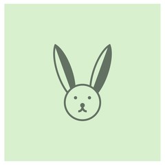 Simple bunny monochrome icon on light green background. - vector