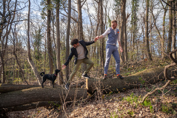 two men, gay couple holding hands, helping each other.