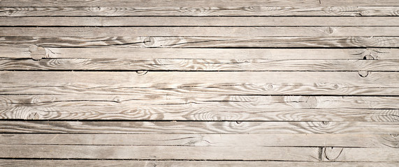 Horizontal wood textured background. Wooden planks on a wall or floor with grain and texture.
