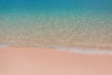 Fototapeta na wymiar Clear sand beach and blue sea 
