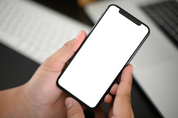 manhands using a smartphone text work digital and communication concept