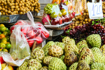 fresh several fruits on street food in rural of local market