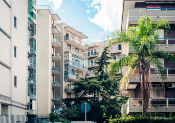 Traditional architecture of Sicily in Italy, street of Catania, facade of buildings.