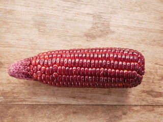 sweet corn on wooden table