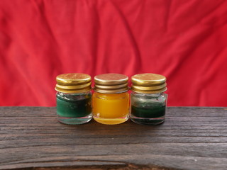 colorful candles on a red background