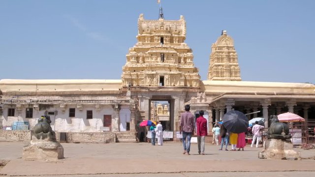 The entry of Virupaksha temple, the oldest shrine, the principal destination for pilgrims and tourists, and remains an active Hindu worship site in Hampi, UNESCO world heritage group of monument