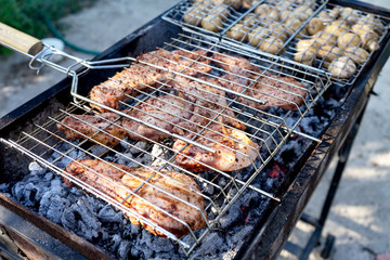 Barbecue on the grill. Cooking meat on the grill.