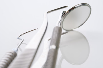 Close up / dental tools use for dentist on the white background.