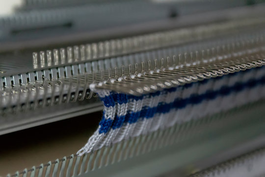 Manual knitting machine. A knitting machine is a device used to create knitted fabrics