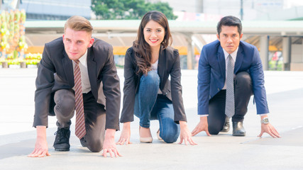 competitive business people in smart suite and cloth sit and prepare to start for running like athletic at outdoor pedestrian
