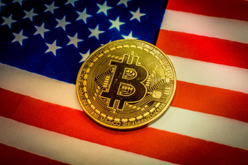 Bitcoin and United States of America Flag. Concept for investors in cryptocurrency and Blockchain Technology in United States of America.