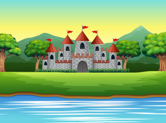Naklejka premium Nature scene with castle and a pond