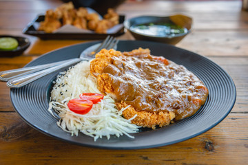 Japanese food tonkatsu curry or fried crispy pork curry served with Japanese rice.