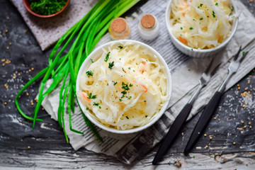 Sauerkraut with carrots and green onions.