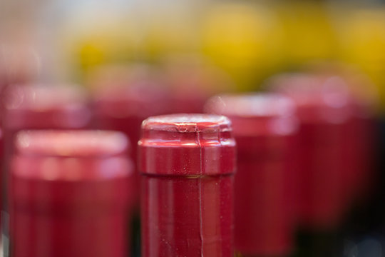 Close up of bottlenecks / red wine bottles