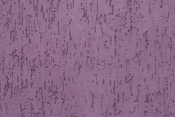 Pink painted relief wall background. Empty space. Abstract pattern on pink plaster texture backdrop. Concrete surface. 