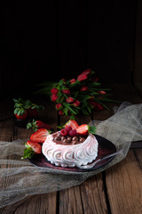 light pavlova with fresh fruits and chocolate