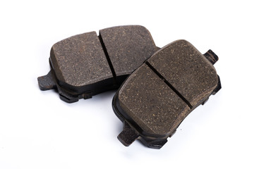 Set of brake pads, car spares isolated on white background