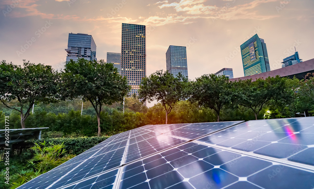 Wall mural ecological energy renewable solar panel plant with urban landscape landmarks