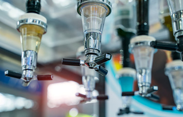 liqueur taps in a bar for spilling drinks
