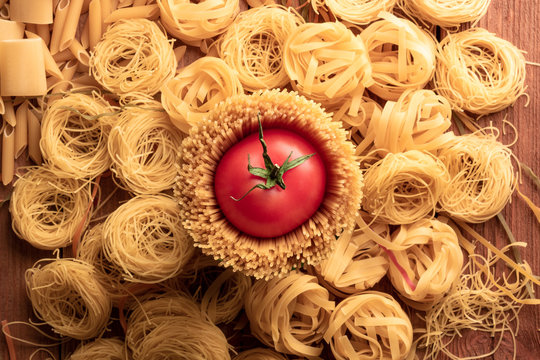 top view different types, colour of pasta and geometric shape on the table