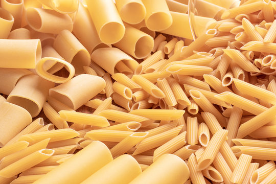 top view different types, colour of pasta and geometric shape on the table