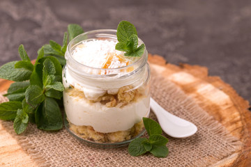 Coconut bisquit dessert with ricotta, mint. Yogurt breakfast