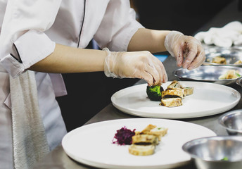 Chef preparing food, meal, in the kitchen, chef cooking, Chef decorating dish