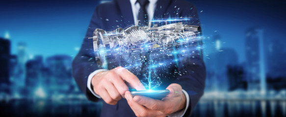 Businessman using wireframe holographic 3D digital projection of an engine