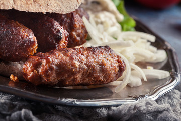 Cevapcici or cevapi served with lepinja bread