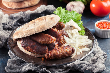 Cevapcici or cevapi served with lepinja bread