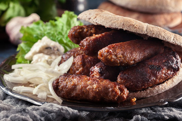 Cevapcici or cevapi served with lepinja bread