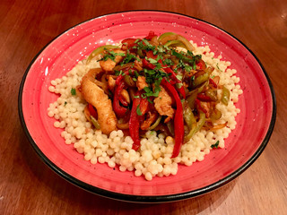 Couscous with Bbq Chicken and Vegetables served at Restaurant / Kuskus