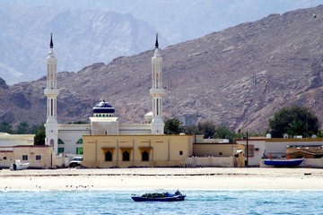 Beautiful picture of a mosque located in a small fishing village in the Sultanate of Oman and...