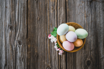 Easter eggs on wood background