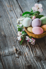 Easter eggs on wood background