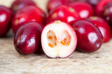 Cut a large cranberry