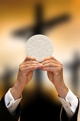 Holy communion on the background of three crosses on top of Golgotha. Easter holiday concept with...