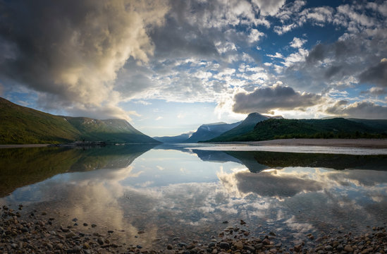 Panorama of the mountain range of Trollheimen National park on the shore of the gjevilvatnet lake Norway
