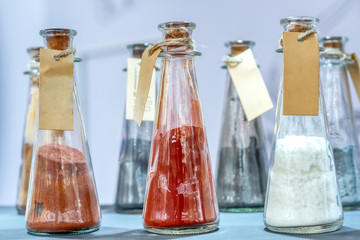 Chemical reagents in glass jars.